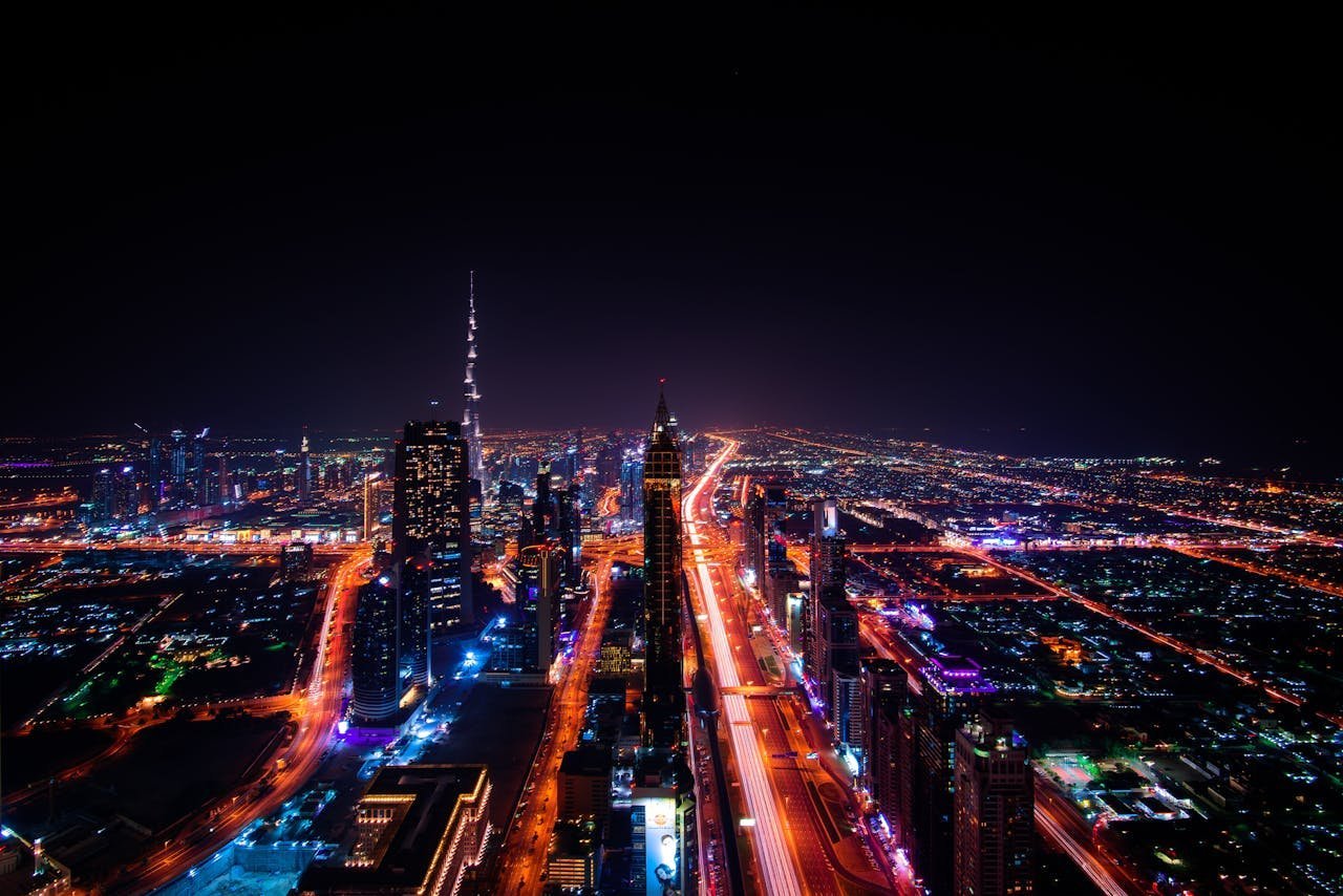 Dubai skyline at night with Burj Khalifa and Sheikh Zayed Road